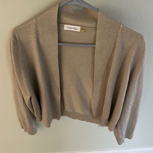 Calvin Klein size large tan with gold sparkles shrug
